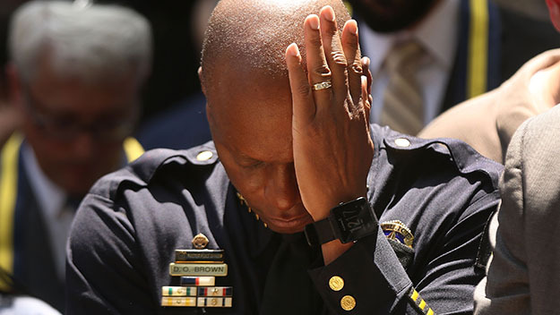 DALLAS, TX - JULY 08: Dallas Police Chief David Brown pauses at a prayer vigil following the deaths of five police officers last night during a Black Live Matter march on July 8, 2016 in Dallas, Texas. Five police officers were killed and seven others were injured in a coordinated ambush at a anti-police brutality demonstration in Dallas. Investigators are saying the suspect is 25-year-old Micah Xavier Johnson of Mesquite, Texas. This is the deadliest incident for U.S. law enforcement since September 11. (Photo by Spencer Platt/Getty Images)