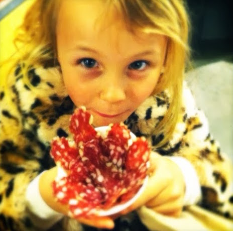 A Fan Enjoys a Cone of Brown Sugar Fennel Salame at Boccalone